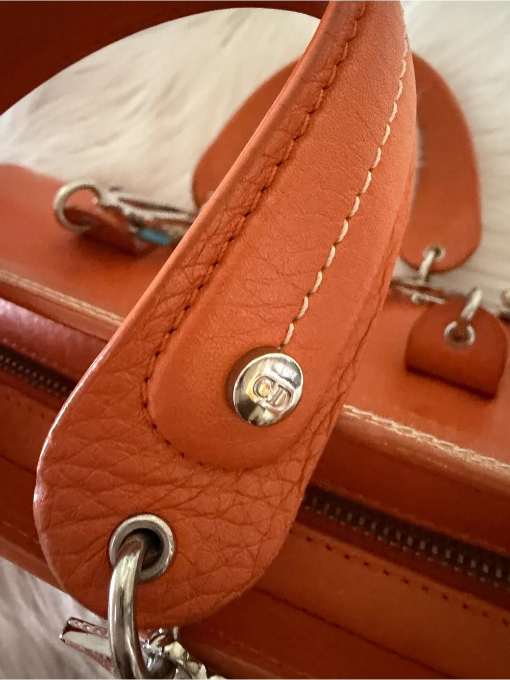 Dior Limited Edition Orange Leather Top-Handle Bag.